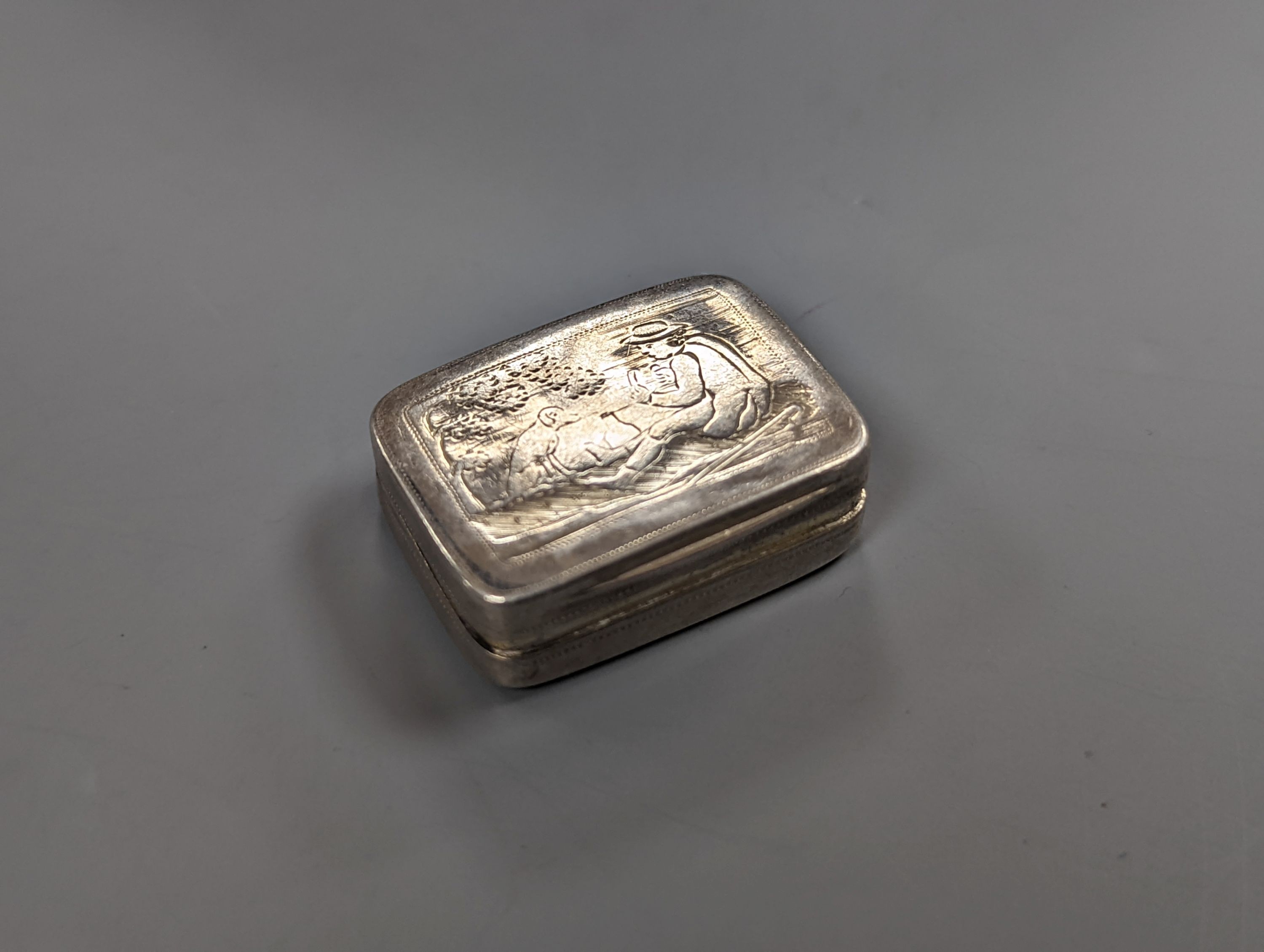 A George III silver vinaigrette, engraved with master and dog, Matthew Linwood, Birmingham, 1811, 30mm.